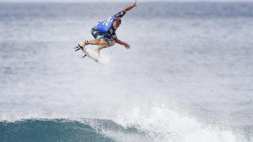 Josh Kerr doing an air in competition.