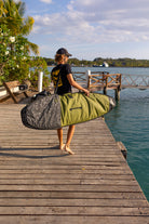 Ben Weiland on dock with prolite session surfboard day bag