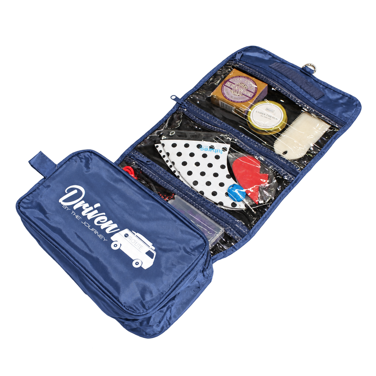 navy blue travel accessory pack with windowed compartments