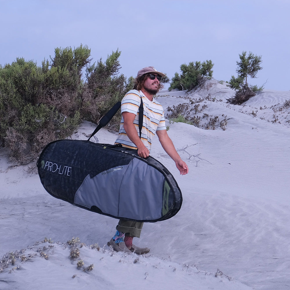 Timmy Reyes with Rhino surfboard travel bag