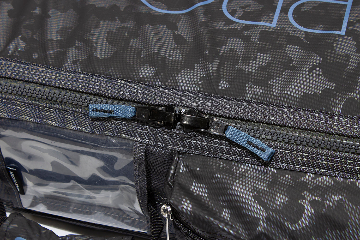 Close up of molded zippers on armored coffin bag.