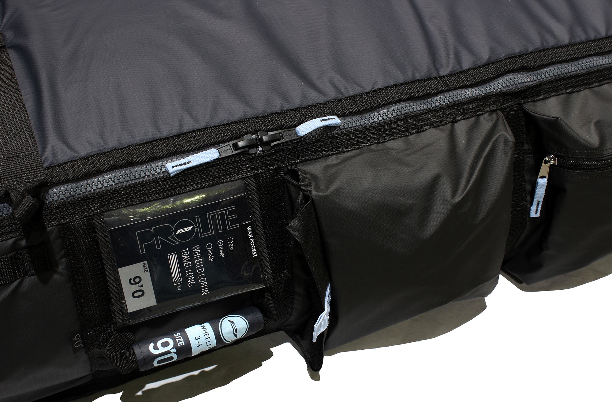 Wheeled coffin surf travel bag for longboards-close up of storage pockets
