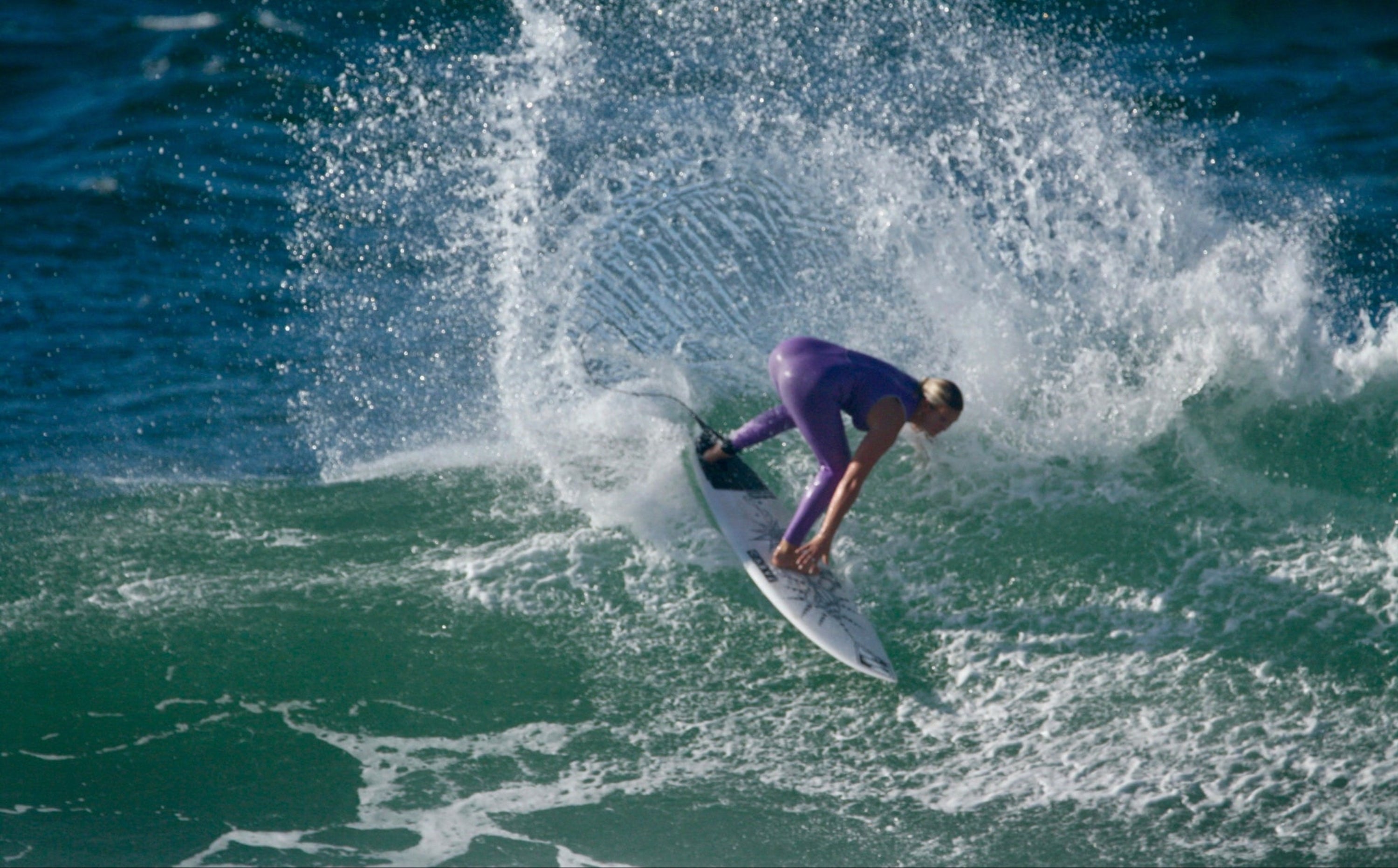 Reid Van Wagoner surfing